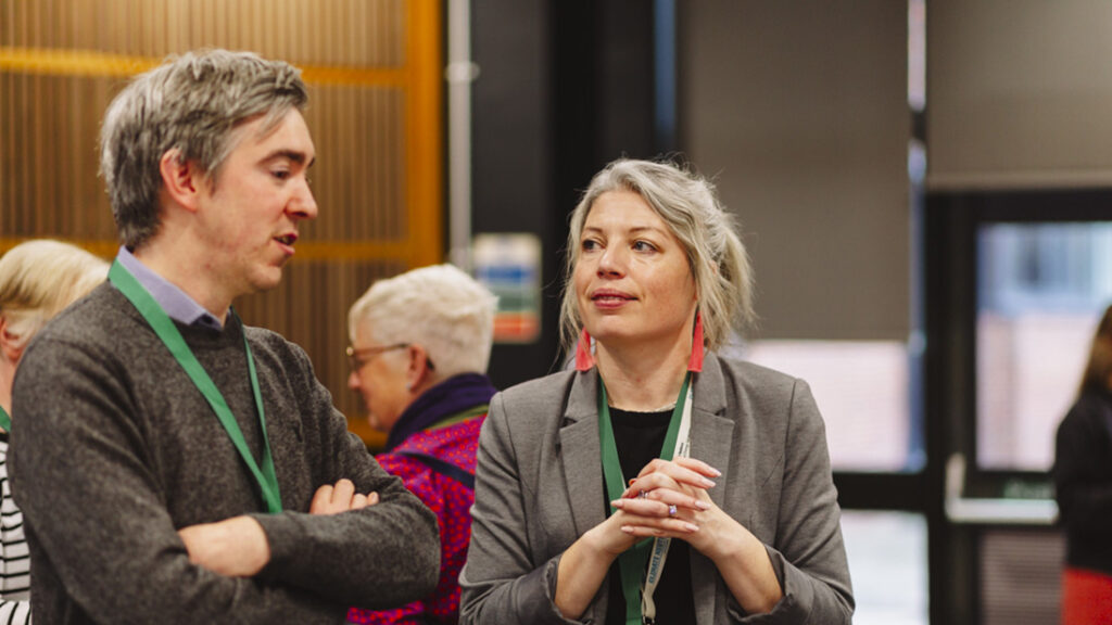 Prof Briony McDonagh talking to a Launch Event delegate