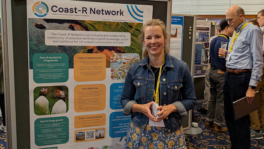 Charlotte Lyddon at the UK Coastal Research conference with Coast-R Network poster