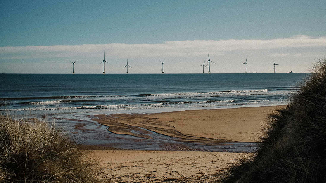 View of offshore wind turbines from the eastern coast of Scotland