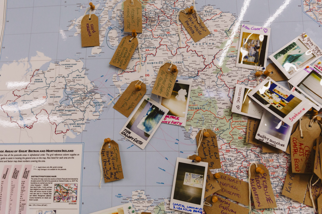 UK map with pinned labels and images