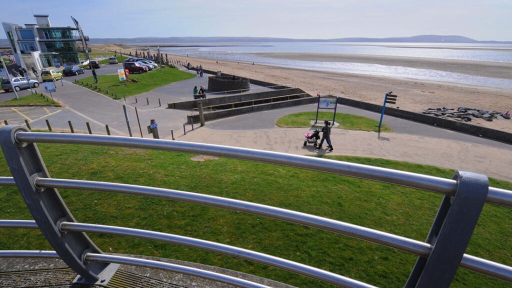 Looking towards the coast, beyond a shared cycle and pedestrian walkway